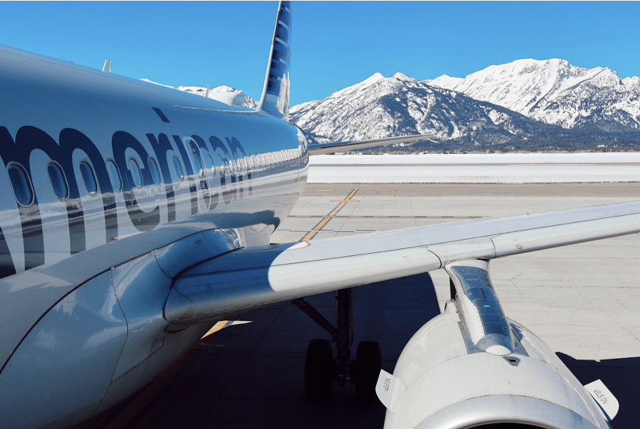 A plane on a tarmac, ready for departure, symbolizing the excitement of future travels